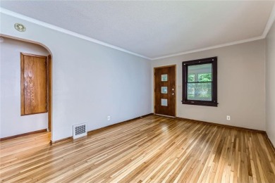 Nestled just steps from beloved Como Park, this sweet and on Como Golf Course in Minnesota - for sale on GolfHomes.com, golf home, golf lot