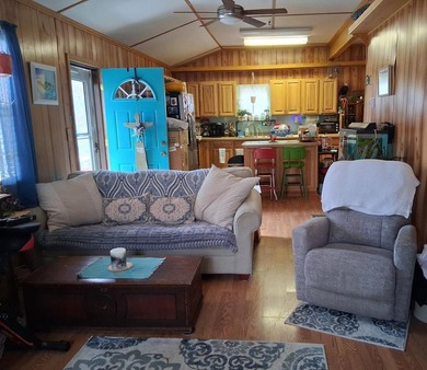 The Perfect coastal retreat in Trails End Seaside Community on Captains Cove Golf and Yacht Club in Virginia - for sale on GolfHomes.com, golf home, golf lot