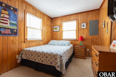 Exceptional contemporary beach home minutes from direct beach on The Currituck Golf Club in North Carolina - for sale on GolfHomes.com, golf home, golf lot