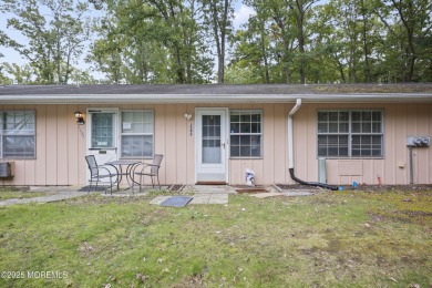 Step into this beautifully remodeled 2-bedroom, 1-bath condo in on Greenbriar Woodlands in New Jersey - for sale on GolfHomes.com, golf home, golf lot