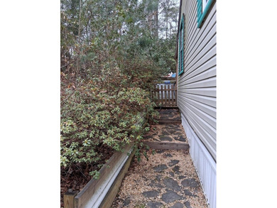 The Perfect coastal retreat in Trails End Seaside Community on Captains Cove Golf and Yacht Club in Virginia - for sale on GolfHomes.com, golf home, golf lot