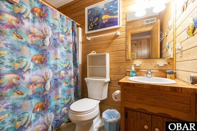 Exceptional contemporary beach home minutes from direct beach on The Currituck Golf Club in North Carolina - for sale on GolfHomes.com, golf home, golf lot