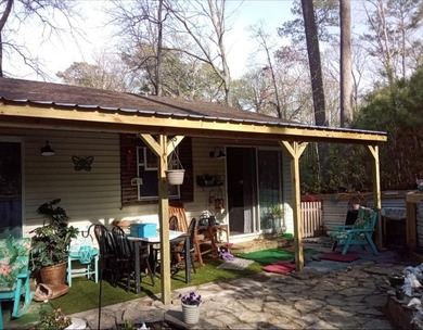 The Perfect coastal retreat in Trails End Seaside Community on Captains Cove Golf and Yacht Club in Virginia - for sale on GolfHomes.com, golf home, golf lot