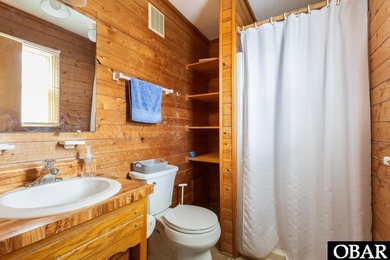 Exceptional contemporary beach home minutes from direct beach on The Currituck Golf Club in North Carolina - for sale on GolfHomes.com, golf home, golf lot