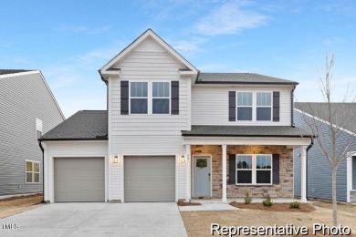 This semi-custom home in Lake Royale offers 3BR/2.5BA and over 2 on River Golf and County Club at Lake Royale in North Carolina - for sale on GolfHomes.com, golf home, golf lot