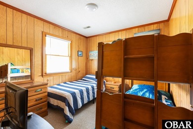 Exceptional contemporary beach home minutes from direct beach on The Currituck Golf Club in North Carolina - for sale on GolfHomes.com, golf home, golf lot