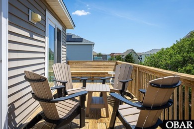 Exceptional contemporary beach home minutes from direct beach on The Currituck Golf Club in North Carolina - for sale on GolfHomes.com, golf home, golf lot