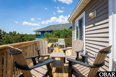 Exceptional contemporary beach home minutes from direct beach on The Currituck Golf Club in North Carolina - for sale on GolfHomes.com, golf home, golf lot