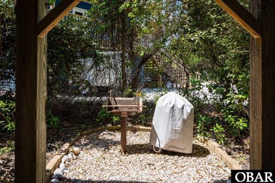 Exceptional contemporary beach home minutes from direct beach on The Currituck Golf Club in North Carolina - for sale on GolfHomes.com, golf home, golf lot