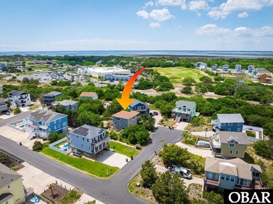 Exceptional contemporary beach home minutes from direct beach on The Currituck Golf Club in North Carolina - for sale on GolfHomes.com, golf home, golf lot