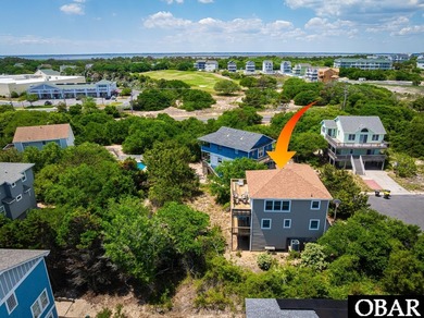 Exceptional contemporary beach home minutes from direct beach on The Currituck Golf Club in North Carolina - for sale on GolfHomes.com, golf home, golf lot