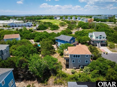 Exceptional contemporary beach home minutes from direct beach on The Currituck Golf Club in North Carolina - for sale on GolfHomes.com, golf home, golf lot