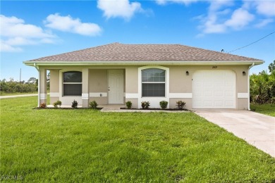 Nestled on a private corner lot, this 3-bedroom, 2-bath home on River Hall Country Club in Florida - for sale on GolfHomes.com, golf home, golf lot