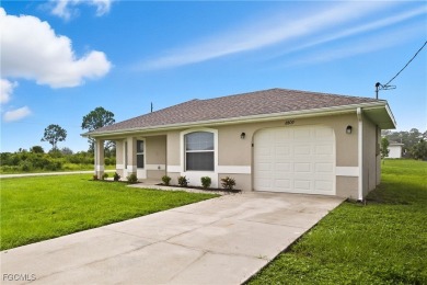 Nestled on a private corner lot, this 3-bedroom, 2-bath home on River Hall Country Club in Florida - for sale on GolfHomes.com, golf home, golf lot