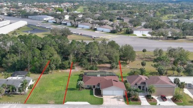 Taxiway Block Hangar home, with a fantastic view of the Spruce on Spruce Creek Golf Club in Florida - for sale on GolfHomes.com, golf home, golf lot