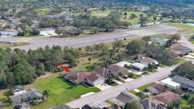 Taxiway Block Hangar home, with a fantastic view of the Spruce on Spruce Creek Golf Club in Florida - for sale on GolfHomes.com, golf home, golf lot