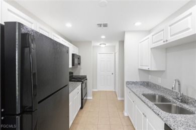 Nestled on a private corner lot, this 3-bedroom, 2-bath home on River Hall Country Club in Florida - for sale on GolfHomes.com, golf home, golf lot