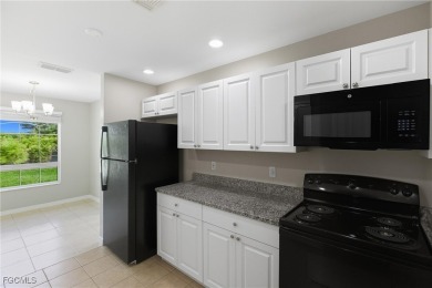 Nestled on a private corner lot, this 3-bedroom, 2-bath home on River Hall Country Club in Florida - for sale on GolfHomes.com, golf home, golf lot