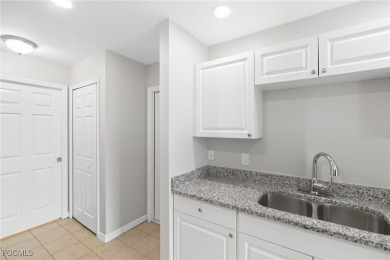 Nestled on a private corner lot, this 3-bedroom, 2-bath home on River Hall Country Club in Florida - for sale on GolfHomes.com, golf home, golf lot