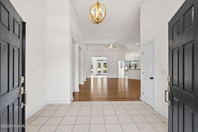 Welcome to this magnificent property offering an array of on Sandpiper Bay Golf and Country Club in North Carolina - for sale on GolfHomes.com, golf home, golf lot