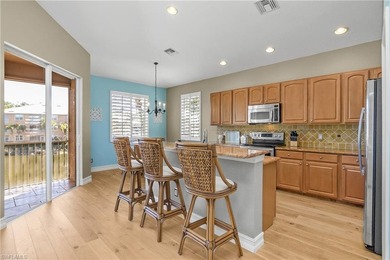 Welcome to this light and bright coach home in the desirable on Spanish Wells Golf and Country Club in Florida - for sale on GolfHomes.com, golf home, golf lot