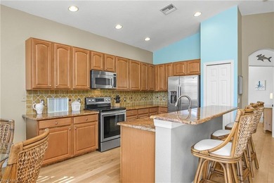 Welcome to this light and bright coach home in the desirable on Spanish Wells Golf and Country Club in Florida - for sale on GolfHomes.com, golf home, golf lot