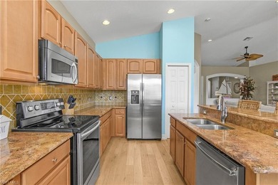 Welcome to this light and bright coach home in the desirable on Spanish Wells Golf and Country Club in Florida - for sale on GolfHomes.com, golf home, golf lot