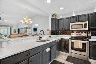 Impeccably manicured home set on a corner lot the The Villages on Nancy Lopez Legacy Golf and Country Club in Florida - for sale on GolfHomes.com, golf home, golf lot