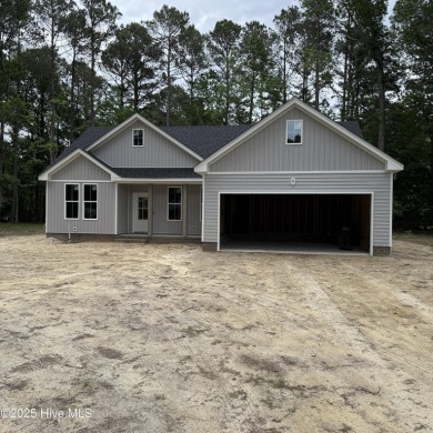 Welcome to your dream home! This stunning new construction on Chowan Golf and Country Club in North Carolina - for sale on GolfHomes.com, golf home, golf lot