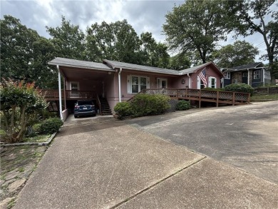 Welcome to this 4 bedroom, 2 bath home offering 1,816 sq ft of on Indian Hills Country Club in Arkansas - for sale on GolfHomes.com, golf home, golf lot