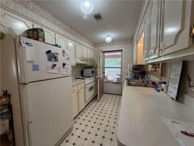 Welcome to this 4 bedroom, 2 bath home offering 1,816 sq ft of on Indian Hills Country Club in Arkansas - for sale on GolfHomes.com, golf home, golf lot