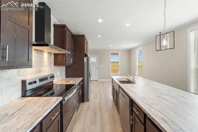 Experience modern country living with breathtaking mountain on Hollydot Golf Course in Colorado - for sale on GolfHomes.com, golf home, golf lot