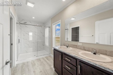 Experience modern country living with breathtaking mountain on Hollydot Golf Course in Colorado - for sale on GolfHomes.com, golf home, golf lot
