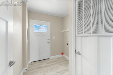 Experience modern country living with breathtaking mountain on Hollydot Golf Course in Colorado - for sale on GolfHomes.com, golf home, golf lot