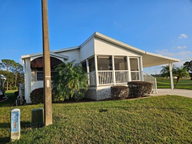 This 2005 Skyline with 2-bedrooms, 2 baths and 1,176 square feet on Big Cypress Golf and Country Club in Florida - for sale on GolfHomes.com, golf home, golf lot