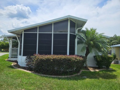 Motivated sellers are offering 1 month paid lot rent on this on Big Cypress Golf and Country Club in Florida - for sale on GolfHomes.com, golf home, golf lot