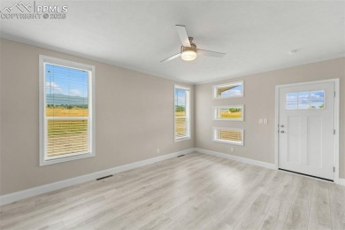 Experience modern country living with breathtaking mountain on Hollydot Golf Course in Colorado - for sale on GolfHomes.com, golf home, golf lot
