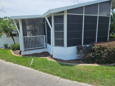 Motivated sellers are offering 1 month paid lot rent on this on Big Cypress Golf and Country Club in Florida - for sale on GolfHomes.com, golf home, golf lot