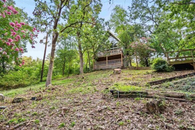 This charming tucked away A-Frame style house is located in the on Hide-A-Way Lake Golf Course in Texas - for sale on GolfHomes.com, golf home, golf lot