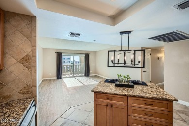 Updated Kitchen and Bathrooms with custom cabinetry and granite on Scottsdale Shadows in Arizona - for sale on GolfHomes.com, golf home, golf lot