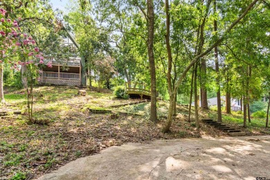 This charming tucked away A-Frame style house is located in the on Hide-A-Way Lake Golf Course in Texas - for sale on GolfHomes.com, golf home, golf lot