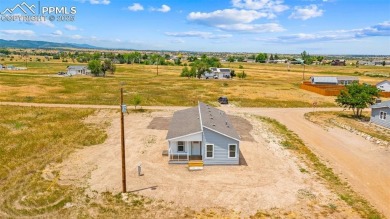 Experience modern country living with breathtaking mountain on Hollydot Golf Course in Colorado - for sale on GolfHomes.com, golf home, golf lot
