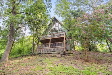 This charming tucked away A-Frame style house is located in the on Hide-A-Way Lake Golf Course in Texas - for sale on GolfHomes.com, golf home, golf lot