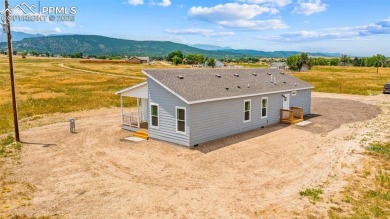 Experience modern country living with breathtaking mountain on Hollydot Golf Course in Colorado - for sale on GolfHomes.com, golf home, golf lot