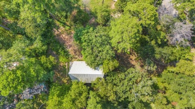 This charming tucked away A-Frame style house is located in the on Hide-A-Way Lake Golf Course in Texas - for sale on GolfHomes.com, golf home, golf lot