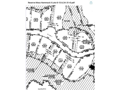 Build your dream home on this beautiful .61-acre wooded lot in on Members Club At St. James Plantation in North Carolina - for sale on GolfHomes.com, golf home, golf lot