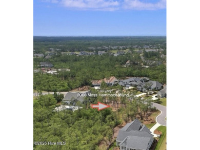 Build your dream home on this beautiful .61-acre wooded lot in on Members Club At St. James Plantation in North Carolina - for sale on GolfHomes.com, golf home, golf lot