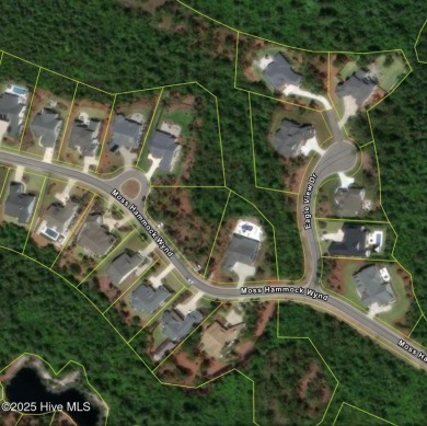 Build your dream home on this beautiful .61-acre wooded lot in on Members Club At St. James Plantation in North Carolina - for sale on GolfHomes.com, golf home, golf lot