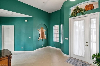 Your Sunny South Naples oasis awaits in this Large Pool Home! on Eagle Lakes Golf Club in Florida - for sale on GolfHomes.com, golf home, golf lot