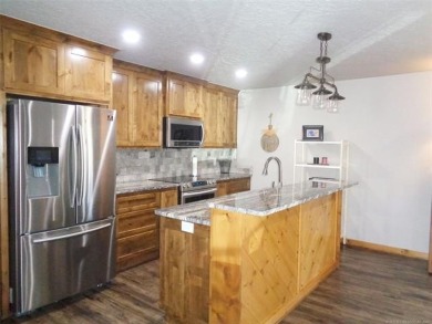 Exceptional Value! Recently remodeled 4 bedroom/3 bath house on Fountainhead State Park Golf Course in Oklahoma - for sale on GolfHomes.com, golf home, golf lot